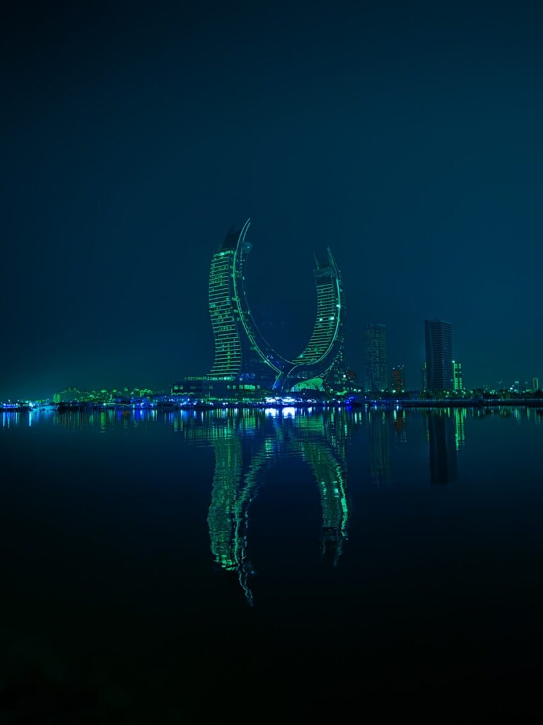 A large body of water with a city in the background